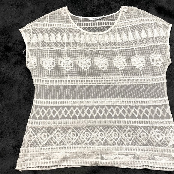 Ricki's Tops - 🦋 2 / $27 🦋 Ricki’s creamy colored T-shirt. Partner it with your own tank top.